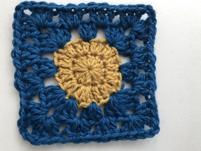 medium circle inside crochet granny square