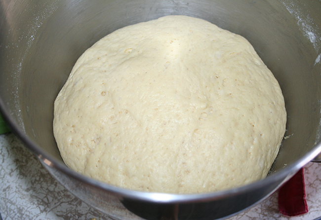 Milk bread dough rising in bowl