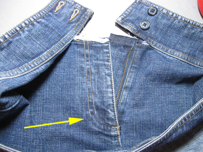 sew fly outline on pants front with arrow