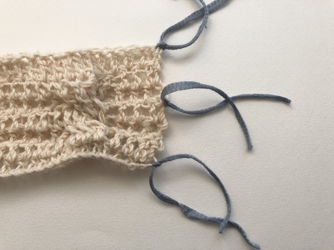 crochet cozy with ribbons