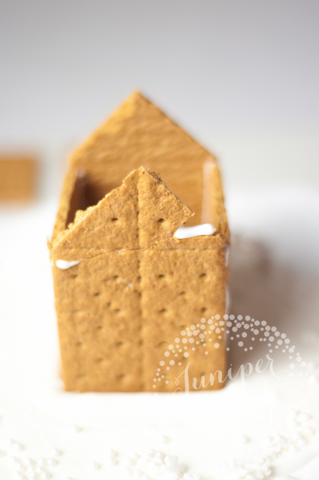 Make a cute gingerbread house using graham crackers