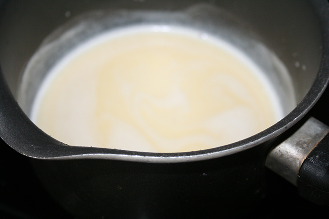 Milk mixture being heated Pan de Jamón