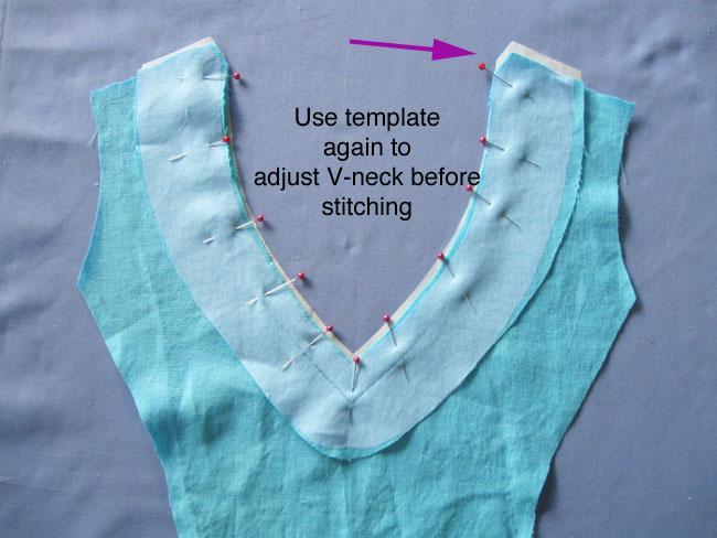 use template to adjust V-neck before stitching