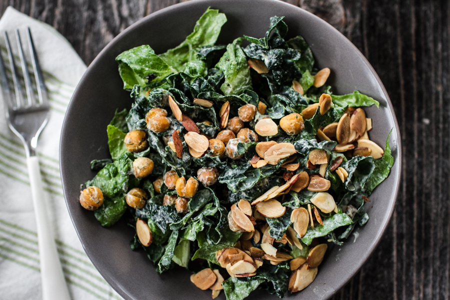 Vegan caesar salad with kale and nuts