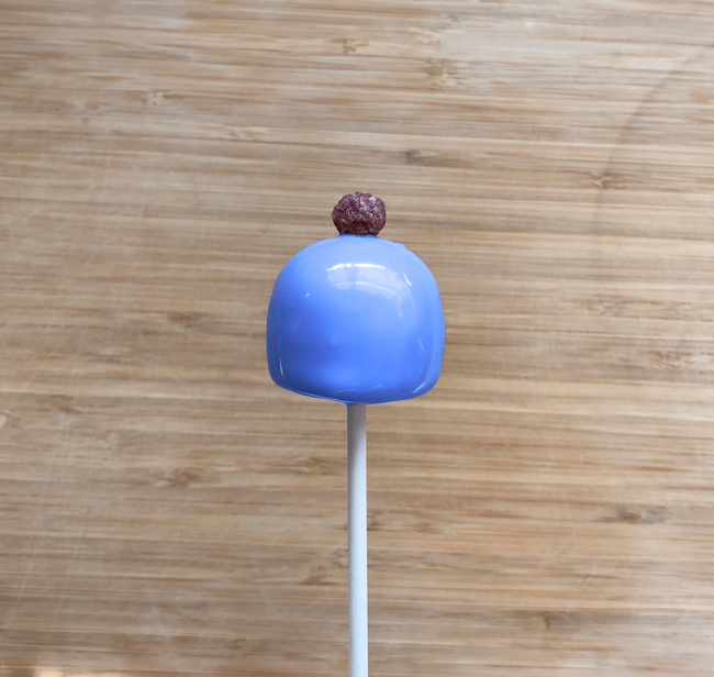Dome cake pop dipped in blue coating