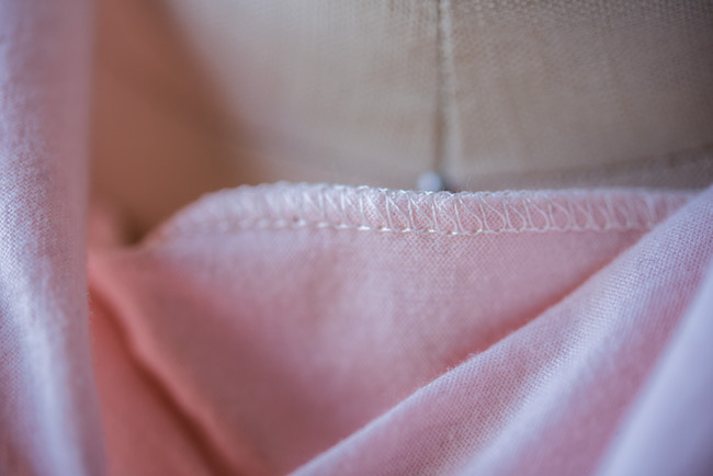 Serger stitching on pink fleece
