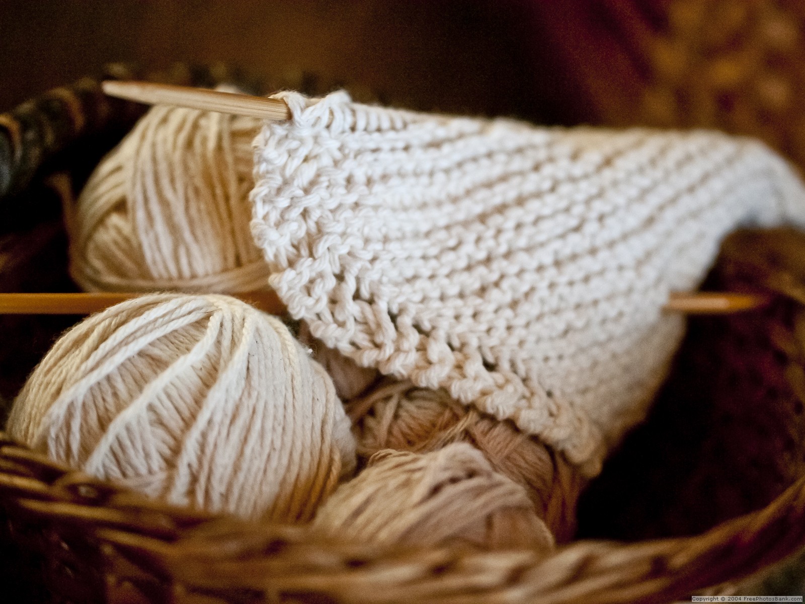 Knitting Basket with Yarn and Knitted Project