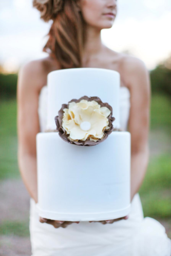Bride Holding Cake with Large Flower: How to Make Sugar Flowers