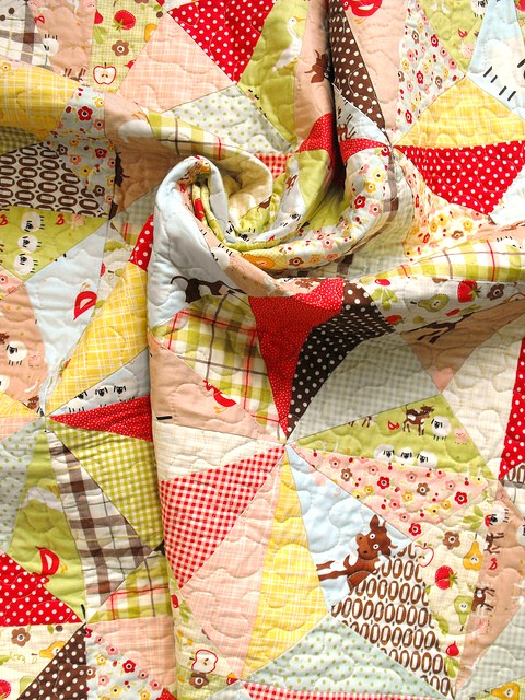 Quilt Created of Patterned Triangle Design