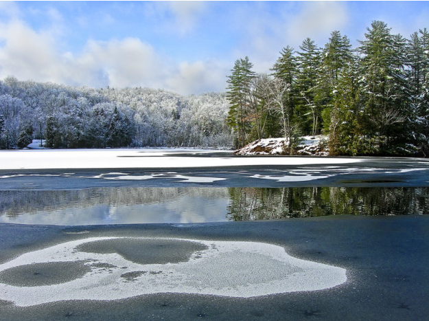 Snow-Covered Mountains and Icy Lake 