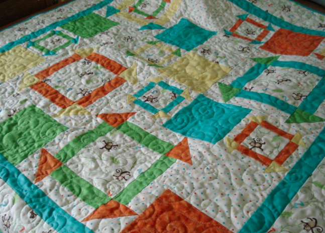 monkey quilt pattern featuring free motion quilting, on Craftsy 