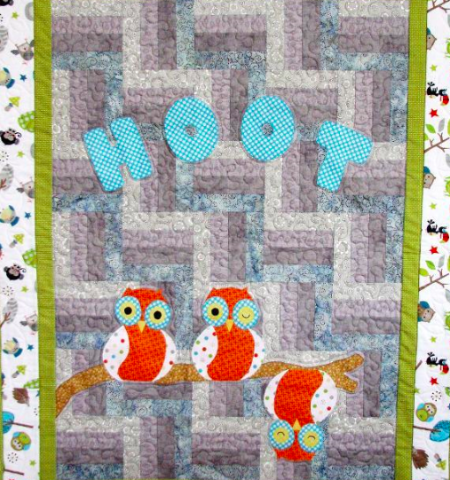 hoot quilt featuring cute, patterned owls