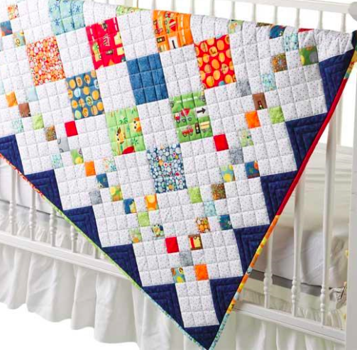 diamond-patterned quilt for baby boys