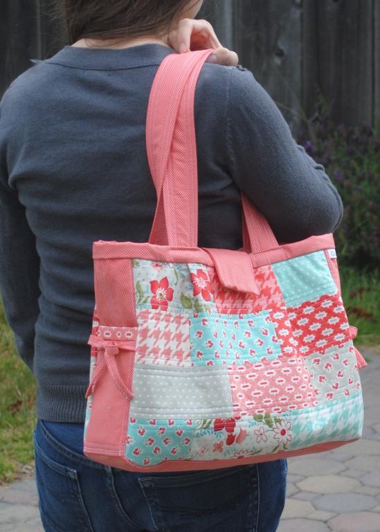 Pink and Pastel Quilted Bag on Woman's Shoulder