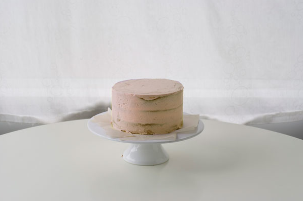 Cake on Stand With Just the Crumb Coat