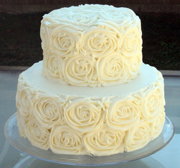 White Wedding Cake Featuring Piped Roses