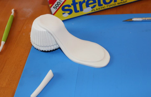 Laying Liner on Sole of Gum Paste Shoe