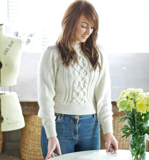 Woman Wearing White Cable Sweater