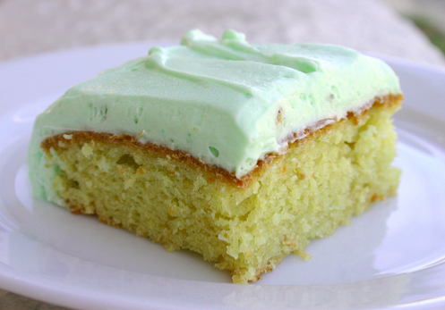 Slice of Pistachio Cake with Green Frosting