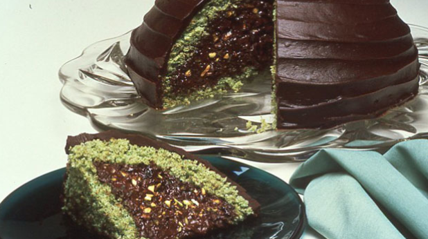 Slice of Boule Cake and Cake Covered in Chocolate