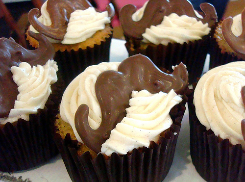 Cupcakes with White Icing and Chocolate Moustaches