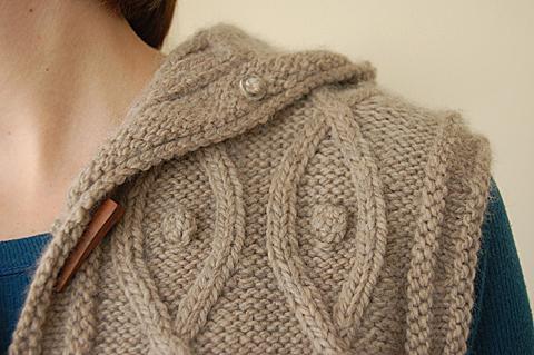 Detail Shot of Shoulder of Knitted Garment on Woman
