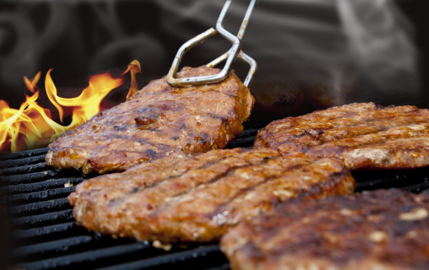 Meat on Flaming Barbecue Grill 