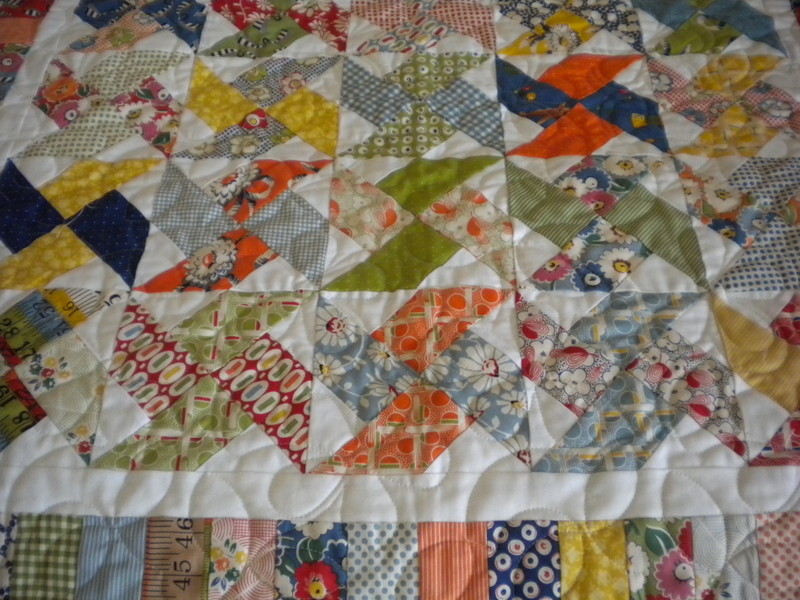 Quilt with Colorful Pinwheel Patterns