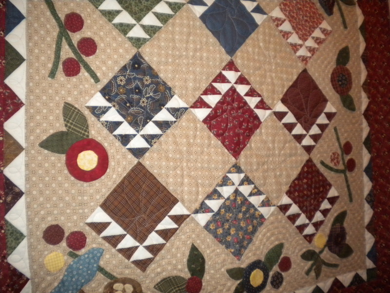 Muted Quilt with Diamond and Fruit Design