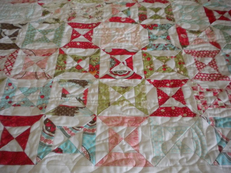 Short Story Quilt Decorated with Quarter-Square Triangles