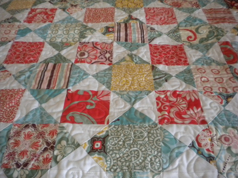 The "Schnibbles Quilt" with Patterned Squares and Triangles