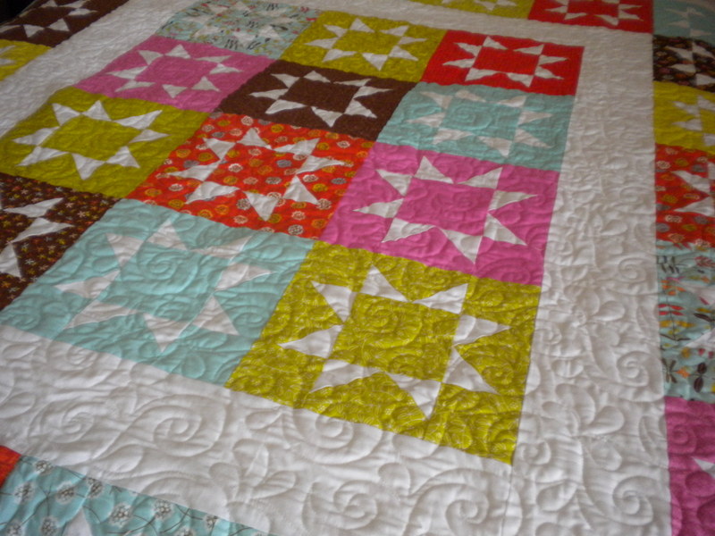 White Quilt with Multicolor Star Blocks