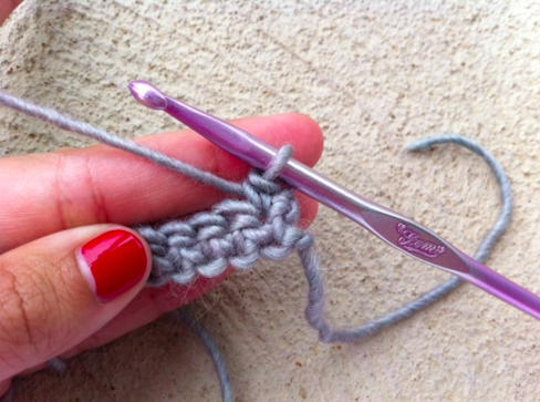 Woman's Hands Showing In-Progress Single Crochet Chain