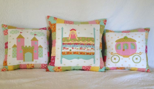 Three Princess-Themed Pillows in a Row