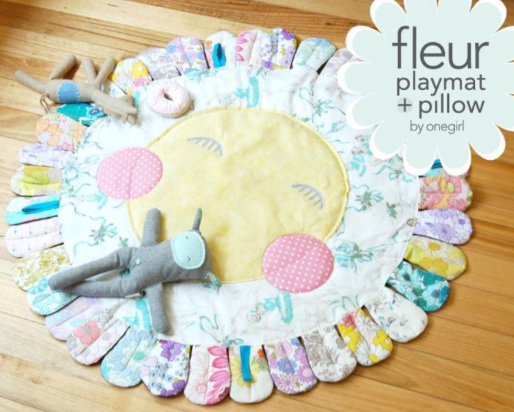 Colorful Playmat with Stuffed Animals on Top