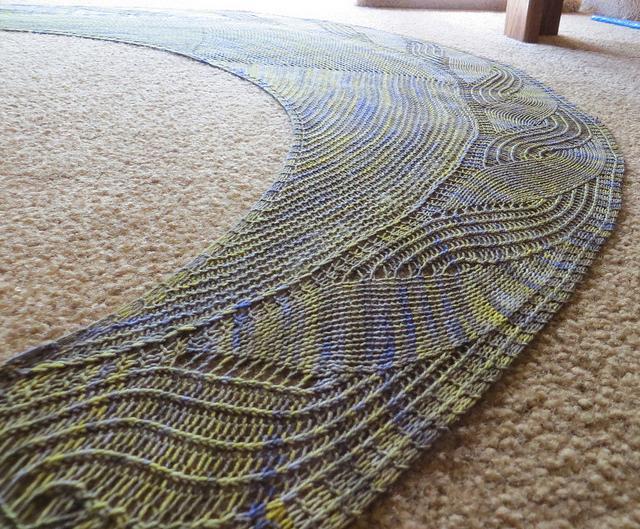 Colorful Shawl Laid out on Rug