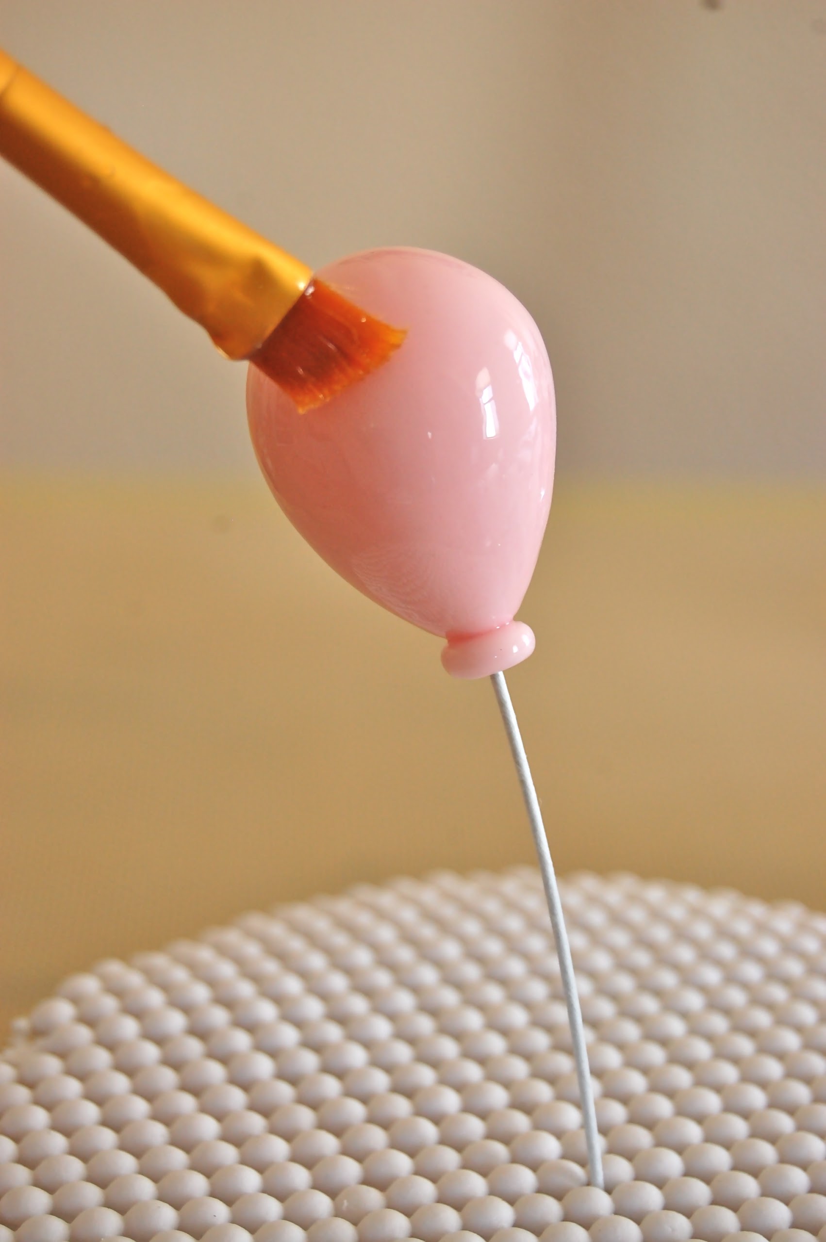 Paint Brush Brushing Shine onto Balloon