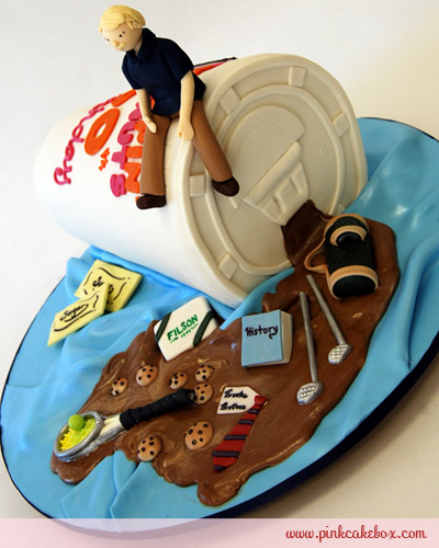 Cake Shaped Like Spilled Coffee with Various Objects in It