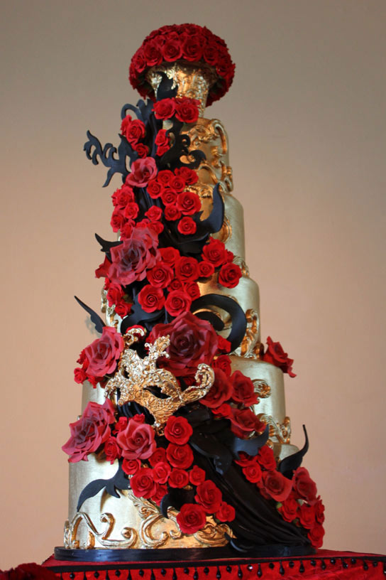 Tiered Shimmering Cake Covered with Red Roses