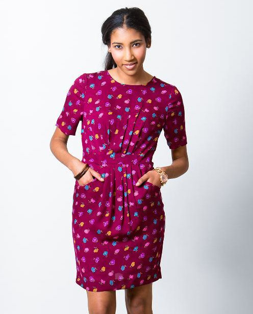 Young Woman Wearing Dark Pink Patterned Dress