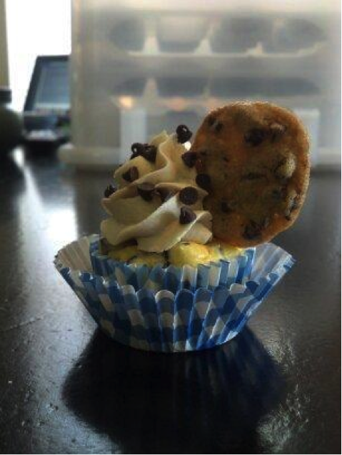 Cupcake in Wrapper with Icing and Mini Chocolate Chip Cookie