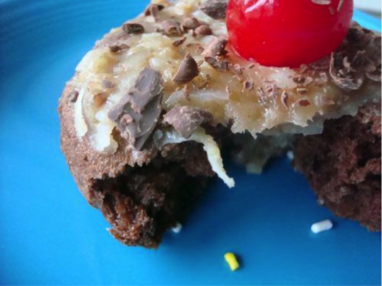 German Chocolate Doughnut Missing a Bite