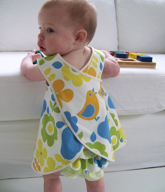 Baby Girl Wearing Colorful Pinafore Dress