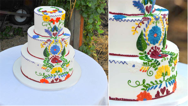 White Tiered Cake with Vibrant Design