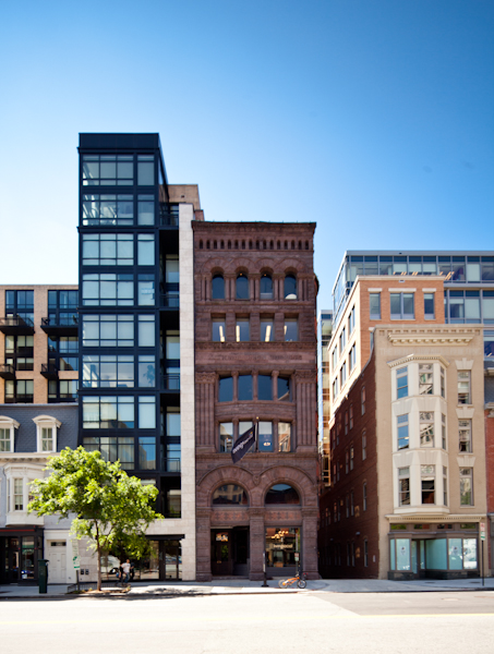 Front View of Several Tall, Narrow City Buildings