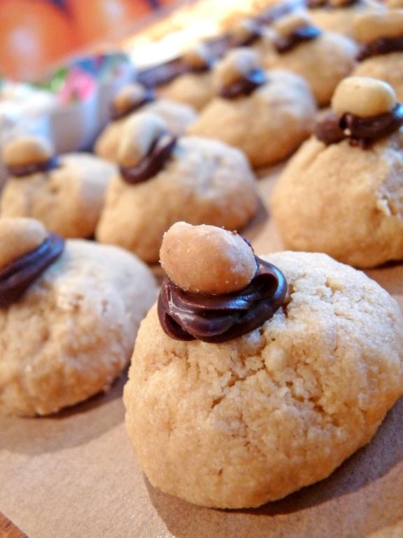 Peanut Butter Cookies Topped with Chocolate and Peanuts