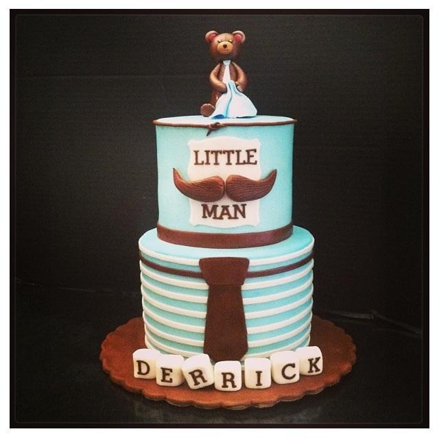 Blue Tiered Cake Topped with Bear, Reading "Little Man"