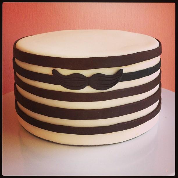 Brown and White Striped Cake with Mustache