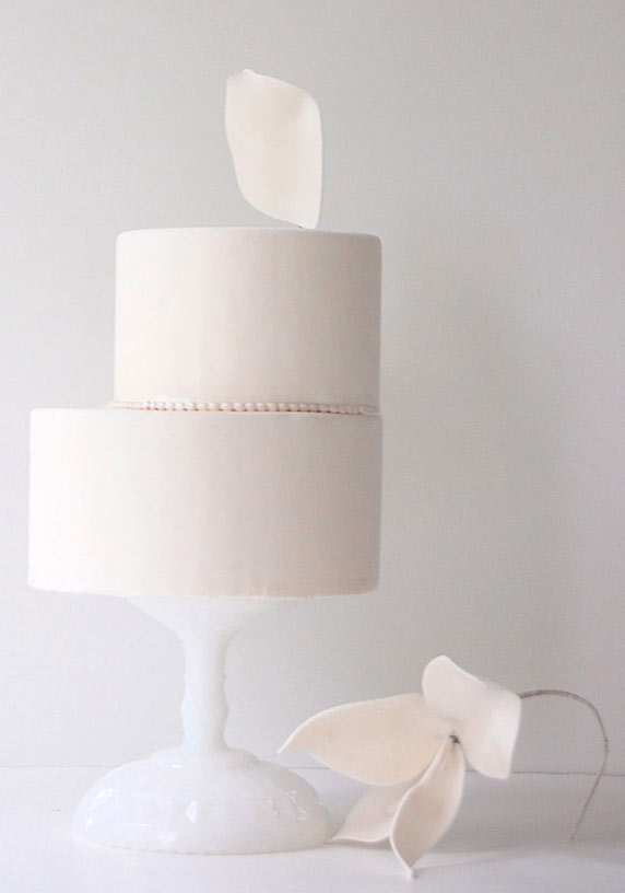 Two Tiered Off-Centered White Cake with Pearls