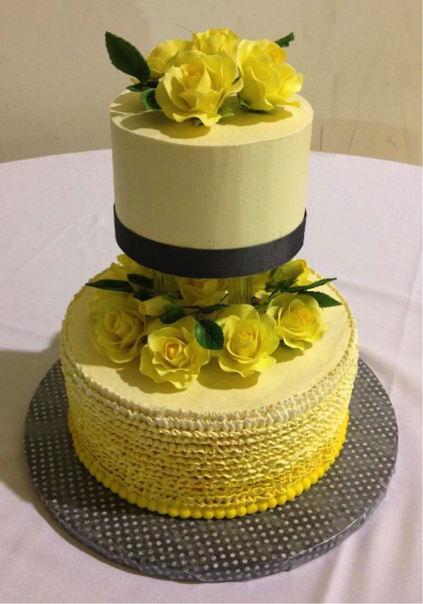 Yellow Ombré Wedding Cake Topped with Flower